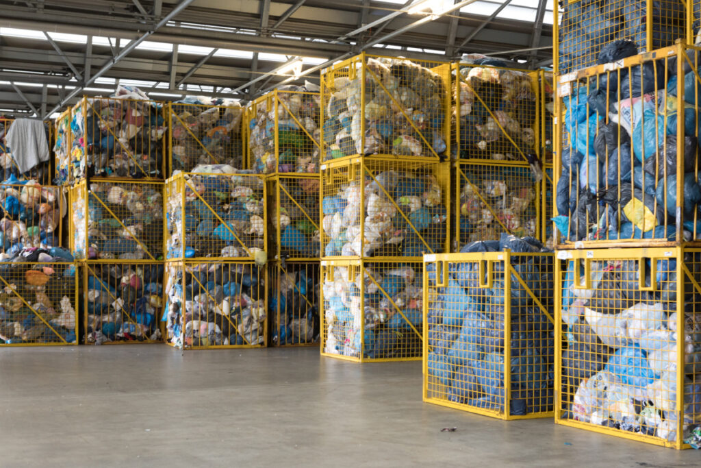 Bags of clothing stored at a clothing recycling business